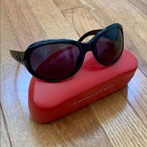 Valentino Elegant Black Sunglasses with Striking Red Case
